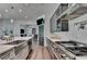 Modern kitchen boasts stainless steel appliances, a large island, and open layout at 1168 Atcheson Ln, Atlanta, GA 30338