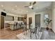 Spacious kitchen and dining area with sleek gray cabinets, modern appliances, and ample counter space at 1168 Atcheson Ln, Atlanta, GA 30338