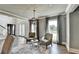 Bright living area featuring hardwood floors, neutral tones, and lots of natural light at 1168 Atcheson Ln, Atlanta, GA 30338