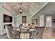 Comfortable living room features vaulted ceiling, modern light fixture, and cozy seating arrangement at 1168 Atcheson Ln, Atlanta, GA 30338