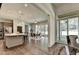 Open concept living with a modern kitchen, dining area, and sliding glass doors to the outdoors at 1168 Atcheson Ln, Atlanta, GA 30338