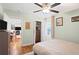 Airy bedroom featuring hardwood floors, natural light from the window, closet and view into the living area at 1202 Key Se Rd, Atlanta, GA 30316