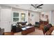 Inviting living room with hardwood floors, modern furniture, and bright windows, adjacent to the entry door at 1202 Key Se Rd, Atlanta, GA 30316