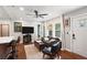 Cozy living room with a ceiling fan and plenty of natural light, steps away from the kitchen bar at 1202 Key Se Rd, Atlanta, GA 30316