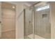 Contemporary tiled shower and walk-in closet in bathroom at 2485 Dixon Pl, Lawrenceville, GA 30045