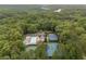 Aerial view of community amenities featuring a pool, tennis, and pickleball courts at 355 Highlands Trce, Roswell, GA 30075