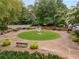 Beautiful outdoor space with tables, chairs, benches, and flowers on display at 355 Highlands Trce, Roswell, GA 30075
