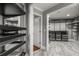 Custom walk-in closet with shelves and ample space for organization at 355 Highlands Trce, Roswell, GA 30075