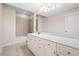 Well-lit bathroom with a large vanity, ample storage, and a shower-over-tub at 576 Cliftwood Ct, Sandy Springs, GA 30328