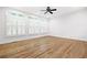 Bright bedroom with many windows and hardwood floors at 576 Cliftwood Ct, Sandy Springs, GA 30328