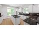 Bright kitchen features granite countertops, stainless steel appliances, and ample cabinet space at 576 Cliftwood Ct, Sandy Springs, GA 30328