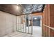 Unfinished basement with concrete walls, ceiling, wood framing, and electrical panel at 112 Tara Blvd, Loganville, GA 30052