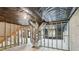Unfinished basement with concrete walls, ceiling, HVAC system and wood framing at 112 Tara Blvd, Loganville, GA 30052