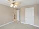 Spacious bedroom with adjoining hallway and closet, plus neutral walls and trim at 112 Tara Blvd, Loganville, GA 30052