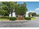 Community entrance with beautiful landscaping, decorative columns, and elegant signage, welcoming residents and visitors at 112 Tara Blvd, Loganville, GA 30052