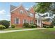 Beautiful brick home featuring a lush front yard and well-maintained landscaping at 112 Tara Blvd, Loganville, GA 30052