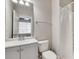 Bathroom with large mirror over the sink and shower and bath combo at 2325 Limehurst Ne Dr, Atlanta, GA 30319