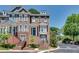 Inviting exterior featuring well-kept landscaping, brick facade, and a secure gated entrance at 2325 Limehurst Ne Dr, Atlanta, GA 30319