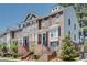 Charming townhome exterior with brick facade, covered entry, and well-maintained landscaping at 2325 Limehurst Ne Dr, Atlanta, GA 30319