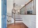 Elegant foyer with hardwood floors, staircase with iron railing, and a welcoming atmosphere at 2325 Limehurst Ne Dr, Atlanta, GA 30319