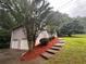 View of the home and its two-car garage from the side yard at 80 Brooks Ln, Dallas, GA 30157