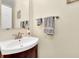 Bathroom featuring vanity with sink, mirror, and towel rack at 2149 New London Place Pl, Snellville, GA 30078