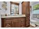 Bathroom showcasing a vanity with a granite countertop, and a framed mirror at 2149 New London Place Pl, Snellville, GA 30078
