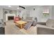Cozy living room featuring a brick fireplace, comfortable seating, and natural light at 2149 New London Place Pl, Snellville, GA 30078