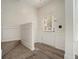 Inviting foyer with fresh neutral paint, new flooring, and white trim at 234 Riverstone Commons Cir, Canton, GA 30114