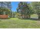 Spacious backyard with well-maintained lawn, privacy fence, and storage shed at 2948 Sagewood Dr, Snellville, GA 30039