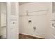 Walk-in closet with wood-look floors, white walls and door, and closet rod at 2948 Sagewood Dr, Snellville, GA 30039