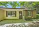 Cozy home with brick accents, front porch, and shuttered windows for a welcoming curb appeal at 2948 Sagewood Dr, Snellville, GA 30039