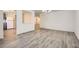 Spacious living room featuring wood floors and a modern open layout with seamless flow to other spaces at 2948 Sagewood Dr, Snellville, GA 30039