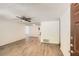 Inviting living room featuring new wood floors, fan, and neutral wall colors at 2948 Sagewood Dr, Snellville, GA 30039