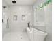 Spa-like bathroom showcasing a luxurious soaking tub and a frameless glass shower with rainfall showerhead at 327 Ohm Ave, Avondale Estates, GA 30002