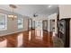 Living Room with hardwood floors, natural light, and stone fireplace at 6350 Manningtree Ct, Cumming, GA 30041