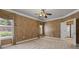 Spacious main bedroom features neutral carpet, tray ceilings and lots of natural light at 6350 Manningtree Ct, Cumming, GA 30041