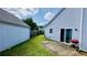 Spacious backyard with a patio, perfect for entertaining, with fenced perimeter at 1972 Brittania Cir, Woodstock, GA 30188
