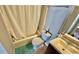 Cozy bathroom featuring a tub and shower combination, toilet, vanity with sink and mirror at 1972 Brittania Cir, Woodstock, GA 30188