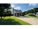 Charming single-story home with well-maintained lawn and a cozy covered entryway at 1972 Brittania Cir, Woodstock, GA 30188