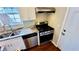 Kitchen featuring stainless steel appliances, granite countertops, and a double sink at 1972 Brittania Cir, Woodstock, GA 30188