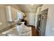 Updated kitchen featuring granite countertops, modern stainless steel appliances, and a stylish design at 1972 Brittania Cir, Woodstock, GA 30188