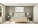 Serene bedroom featuring a comfortable bed, neutral tones, and soft lighting for a peaceful retreat at 2288 Linden Pass, Douglasville, GA 30135
