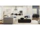 Inviting living room with a plush sofa, modern decor, and open layout, creating a welcoming space for relaxation and entertainment at 2288 Linden Pass, Douglasville, GA 30135