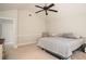 Relaxing bedroom with a ceiling fan, plush carpeting, and neutral decor at 2521 Livingston Ct, Loganville, GA 30052