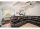 Spacious living room with coffered ceilings, hardwood floors, and an open concept to the dining area at 2521 Livingston Ct, Loganville, GA 30052