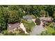 An aerial view of the home with beautiful landscaping and mature trees in a quiet neighborhood at 2795 Bentwood Dr, Marietta, GA 30062