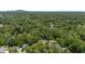 Expansive aerial shot of the neighborhood with lush greenery surrounding the homes, showcasing a peaceful community at 2795 Bentwood Dr, Marietta, GA 30062