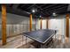 Finished basement area with light wood flooring and a ping pong table at 2795 Bentwood Dr, Marietta, GA 30062