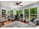 Sunroom with hardwood floors, large windows, and access to a deck at 2795 Bentwood Dr, Marietta, GA 30062